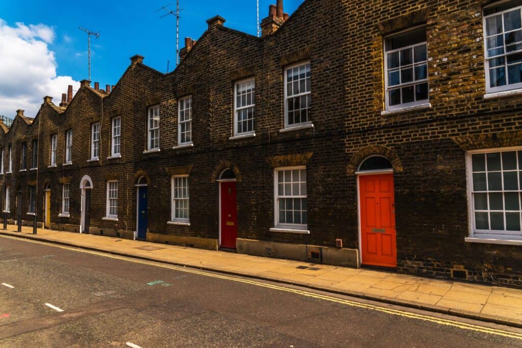 Typical old English residential buildings in the concept of saving money when moving to Barnet.