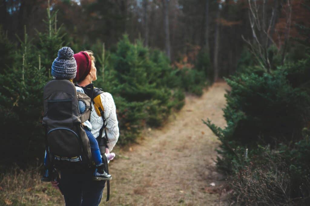 A mother and child on a hiking trail