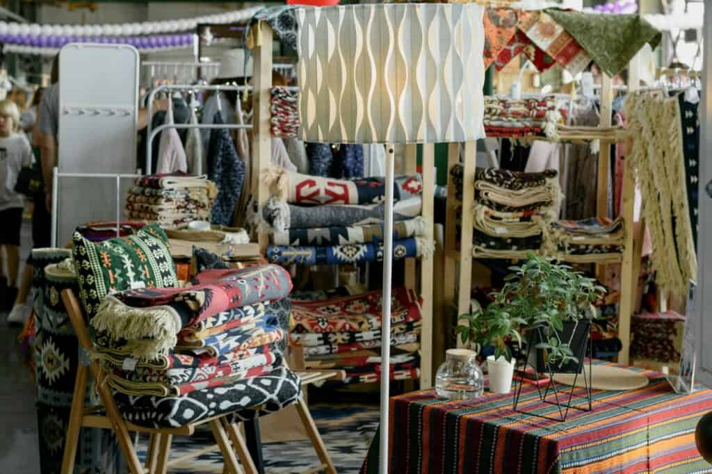 Carpets, rags, pillows, chairs, and lamps for sale in the concept of 'best local shops and markets in Barnet'.